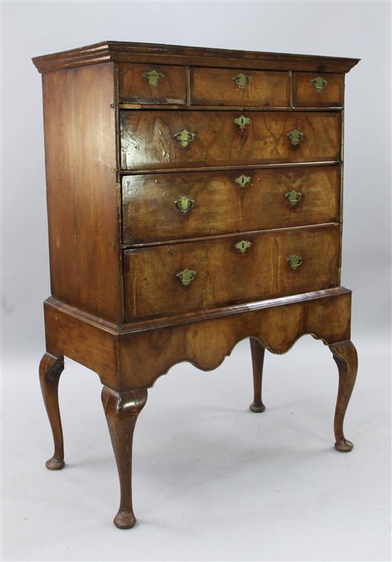 An early 18th century walnut chest on later stand, W.3ft 3in. D.1ft 9in. H.4ft 10in.
